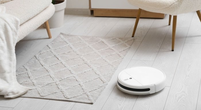 Robotstofzuiger met dweil